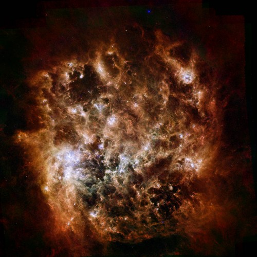 Die Große Magellansche Wolke im Infrarotlicht - man sieht vor allem den Staub (Bild: ESA/NASA/JPL-Caltech/STScI)